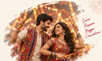 Couple playing Garba and Dandiya with joy